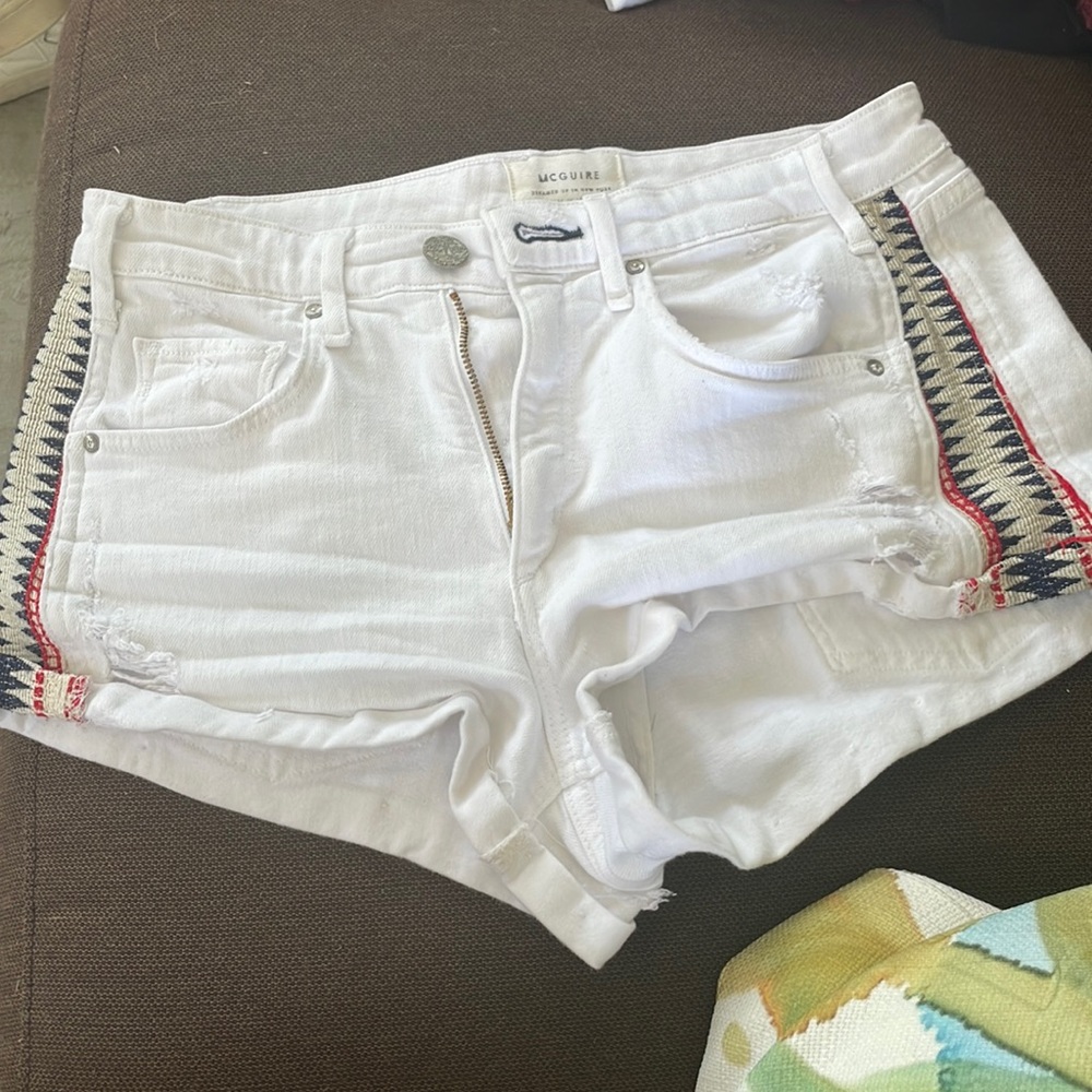 White shorts with cute red and blue design on the side